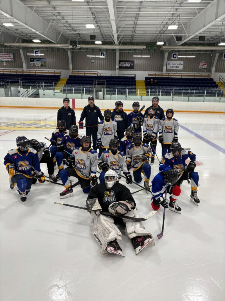 Huntsville hockey team with student 2024