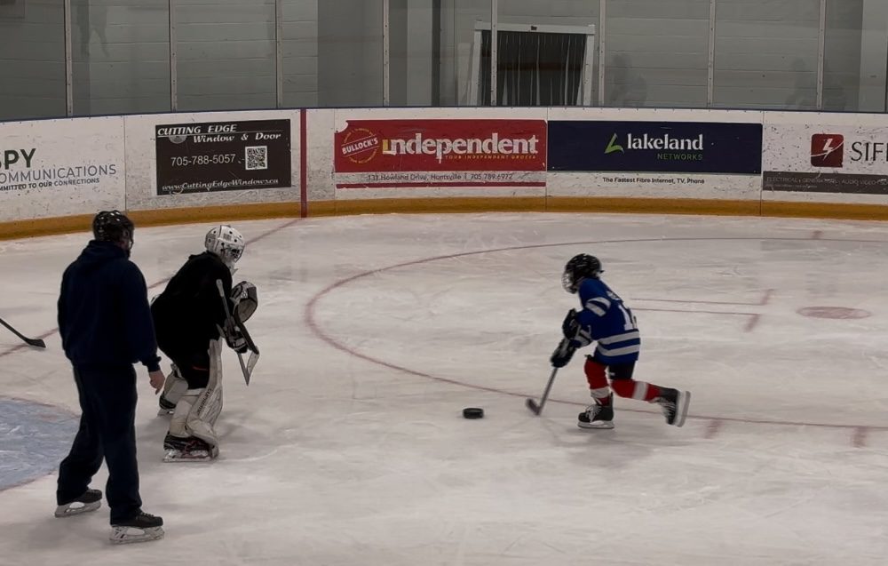 Huntsville hockey team with student 2024