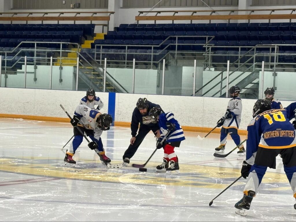 Huntsville hockey team with student 2024